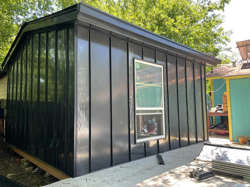 Black standing seam metal wall panels for Metal Roof Installation in Gantt